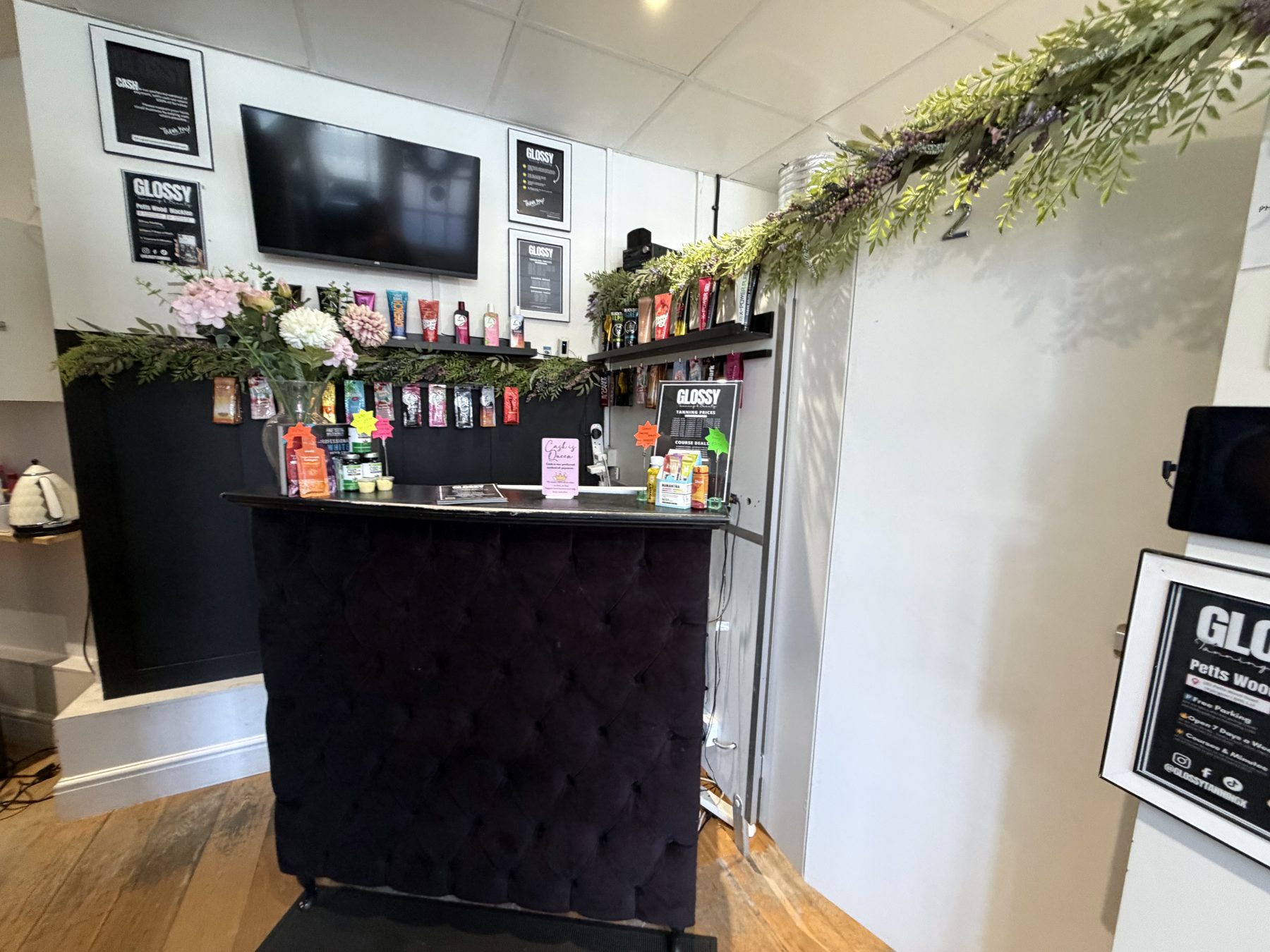 Reception and product wall at Glossy Petts Wood