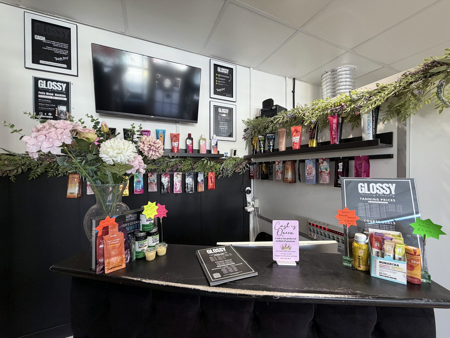 Tanning lotions on the reception desk at Glossy Petts Wood